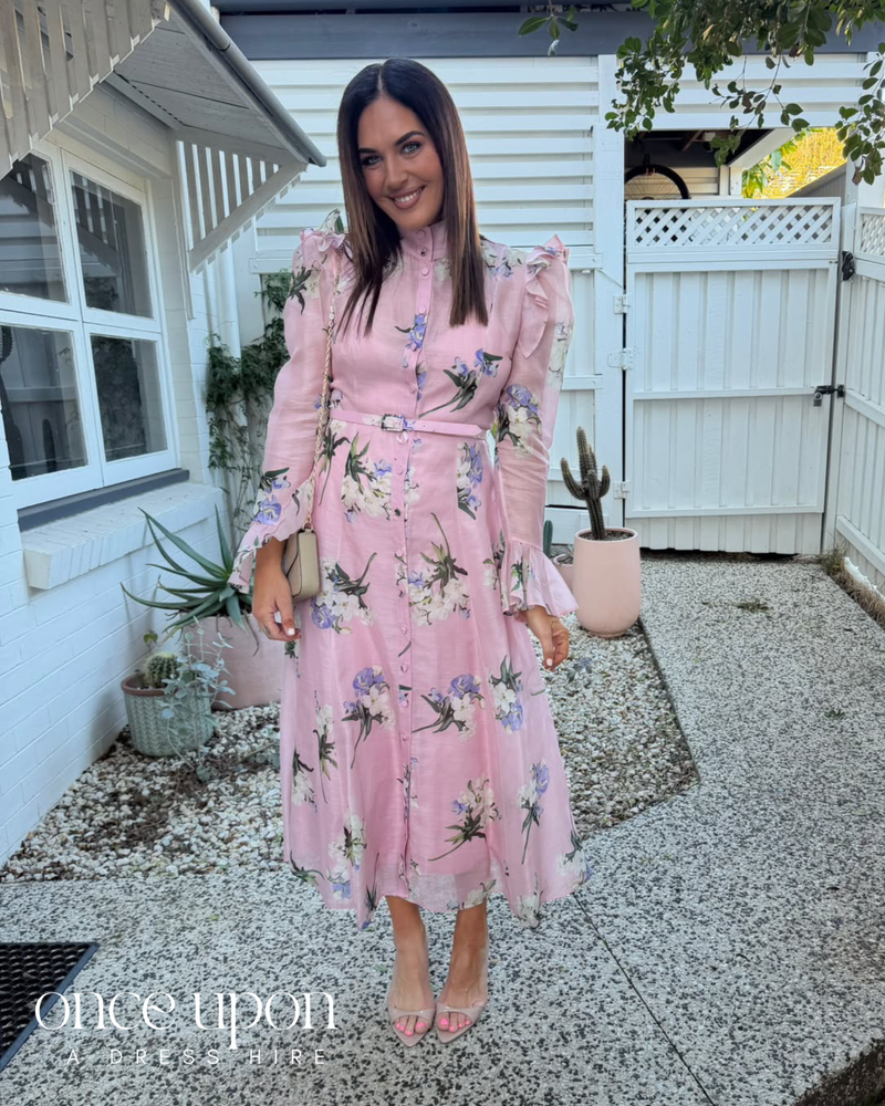 Leo Lin Katrina Butterfly Sleeve Midi Dress in Bouquet Pastel Pink print, lifestyle view outdoors