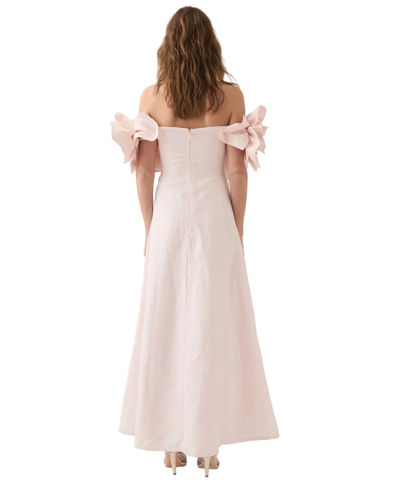 Pink off-shoulder dress with 3D floral details on a white background