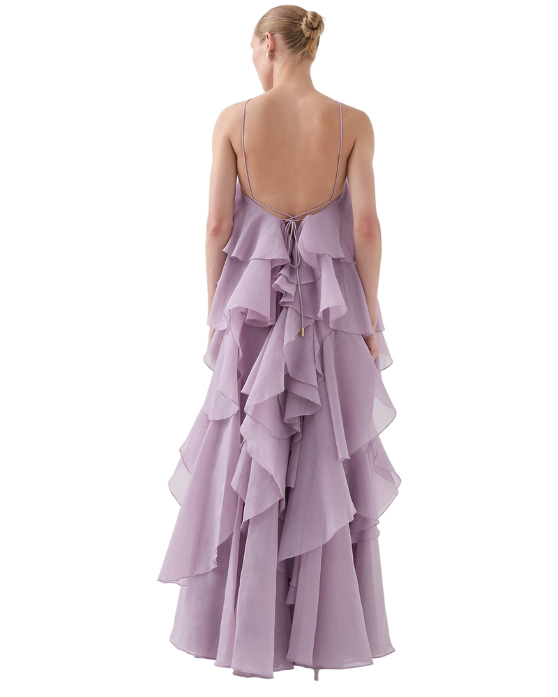 Purple ruffled dress on a white background