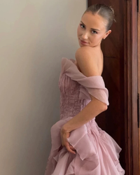Aje Nisha Gown in fawn pink, lifestyle close-up indoors