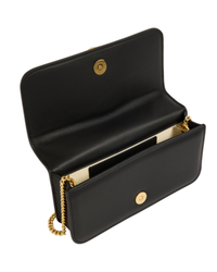 Aje Alessia Flower Clutch in black, open, showing the interior