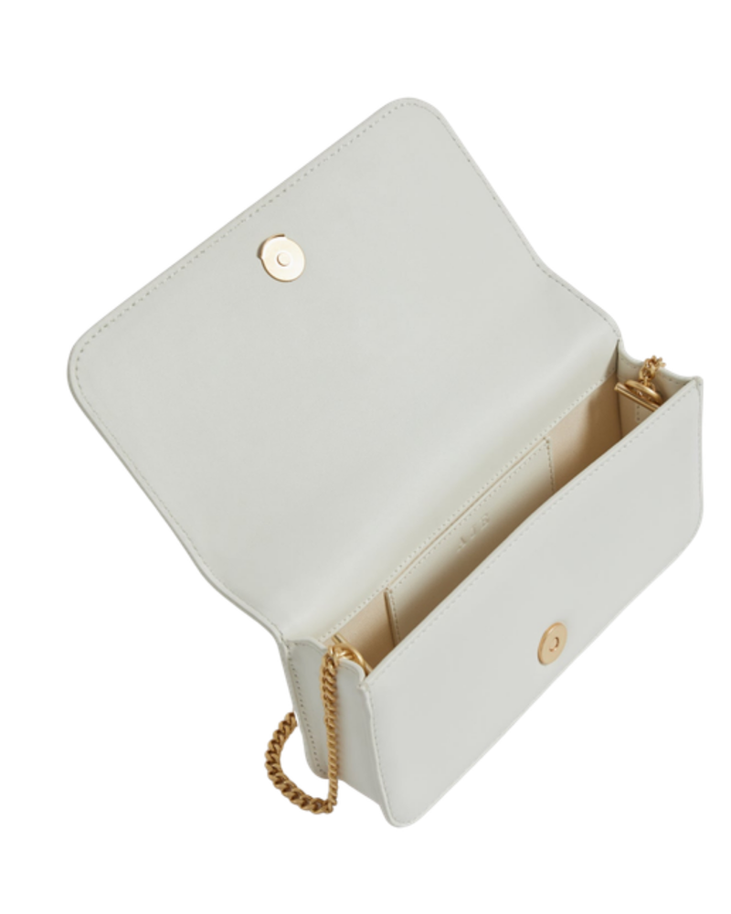 Aje Alessia Flower Clutch in ivory, open, showing the interior
