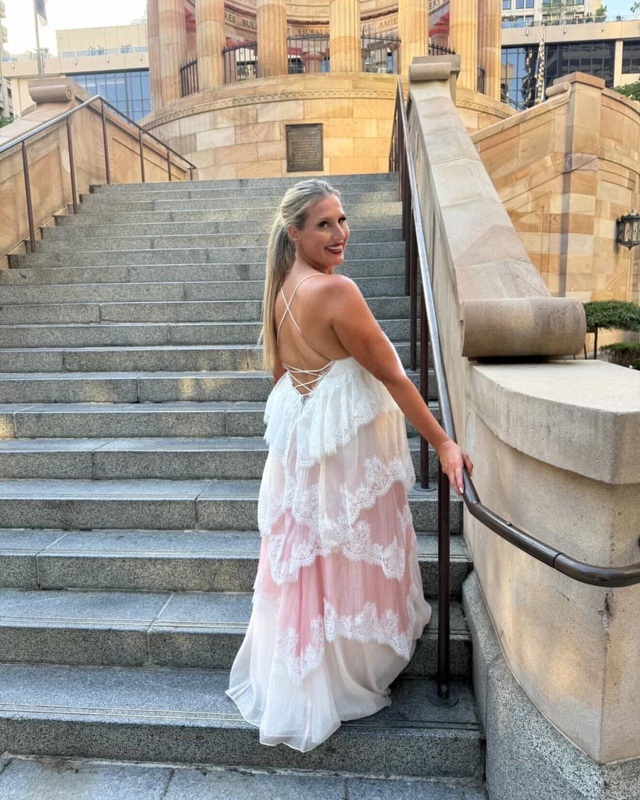 Customer in Aje Ophelia Lace Gown Multi
