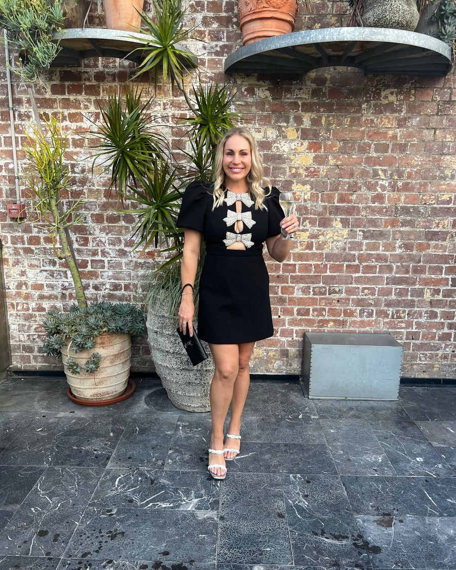 Customer in Rebecca Vallance Juliana Puff Sleeve Mini Dress Black